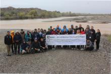 Final group photo of all German and local stakeholders on the bank of the Naryn river 
